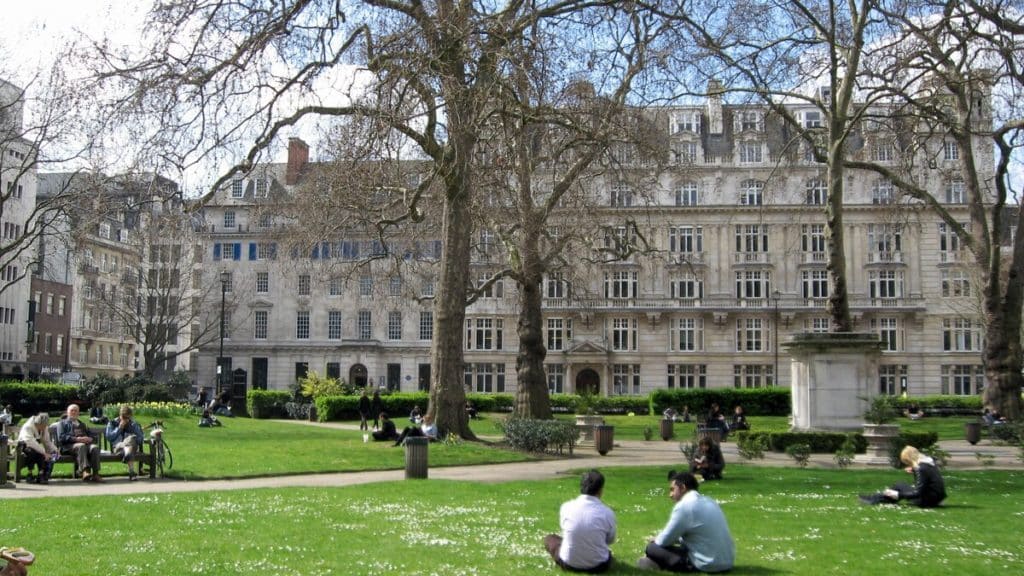 people sat in the greenery of cavendish square