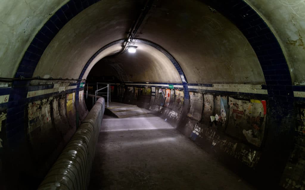 an abandoned tunnel in an abandoned london tube station