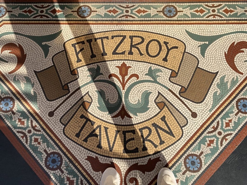 a mosaic in the floor reading 'fitzroy tavern'