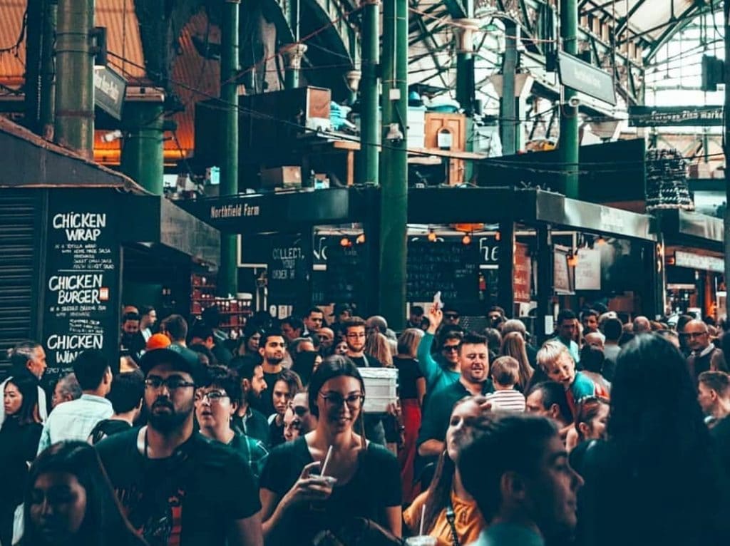 People milling about Borough Market, one of the best things to do alone in London