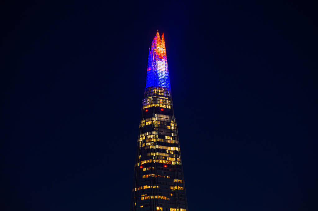 a mosaic candle display lighting up the top floors of the shard at night