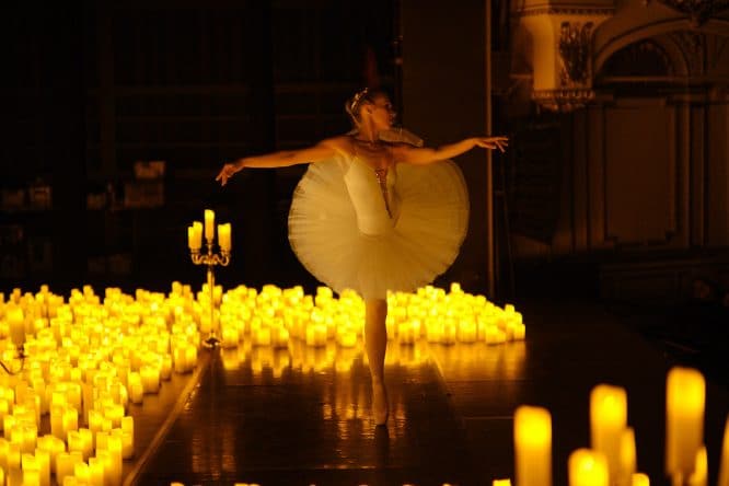 A ballet dancer performing at a Candlelight performance in the prestigious Central Hall 