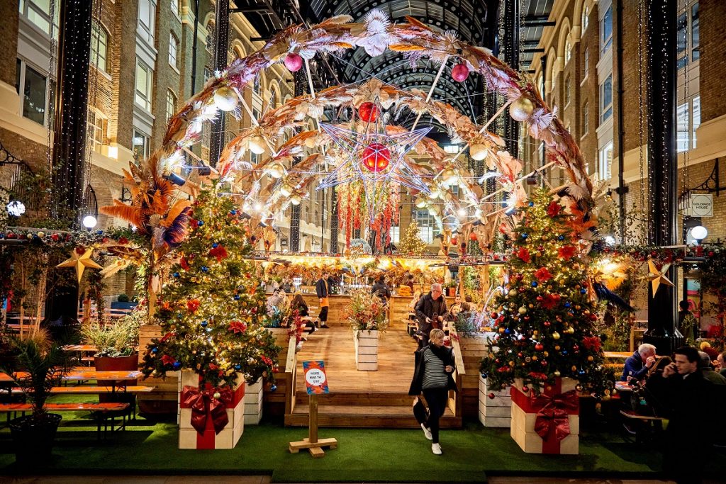 festive decorations and flower displays at london Bridge's Winter by the River markets