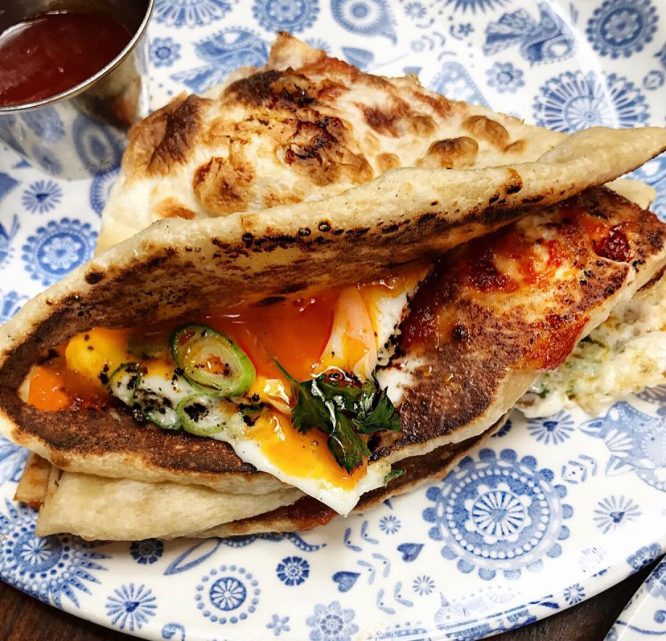 A tasty bacon naan served at Dishoom – home of one of the best London breakfasts