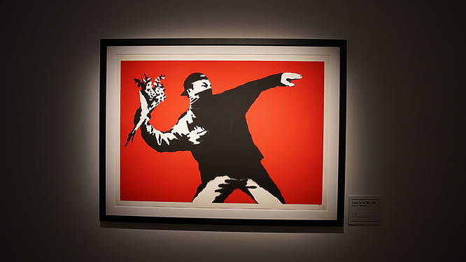 A Banksy painting taken from The Art of Banksy exhibition in London