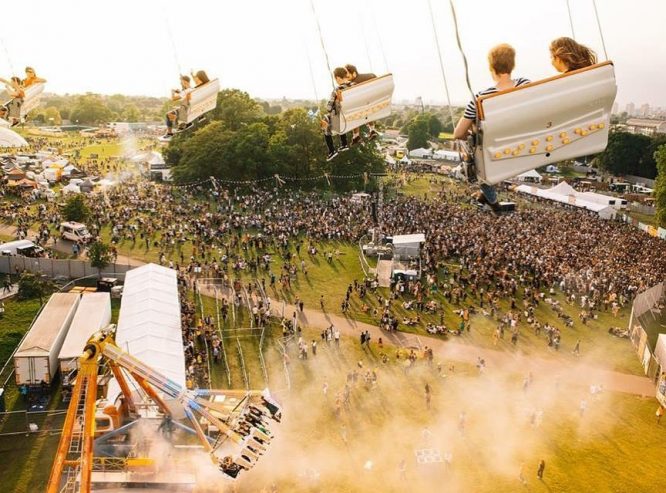 People enjoying a ride and overlooking the crowds at Field Day festival in London