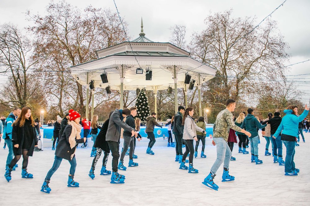 A group of people ice skating in the famous Winter Wonderland 