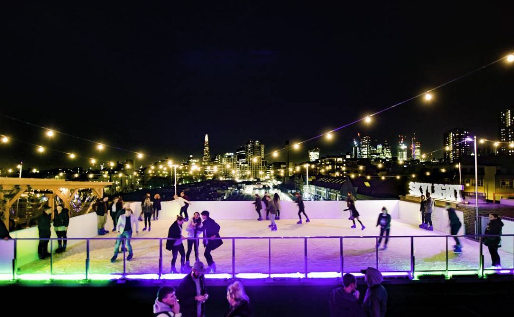 People enjoying the ice skating rink at Skylight in Wapping 