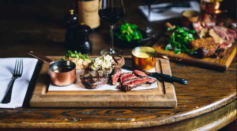 A delicious spread of beef and drinks served at the bottomless brunch at The Jugged Hare