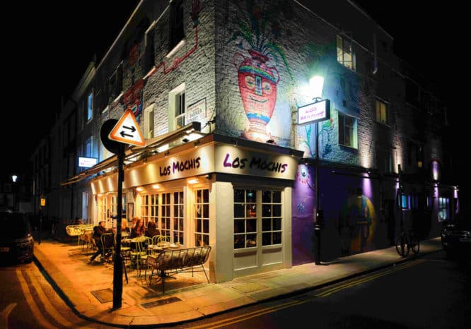 The lit-up exterior of Los Mochis restaurant in Kensington