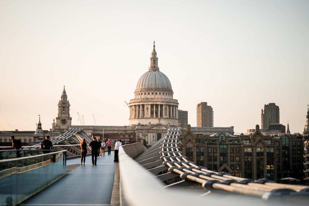 A panoramic view of St. Paul's Cathedral and the Millennium Bridge in London, England