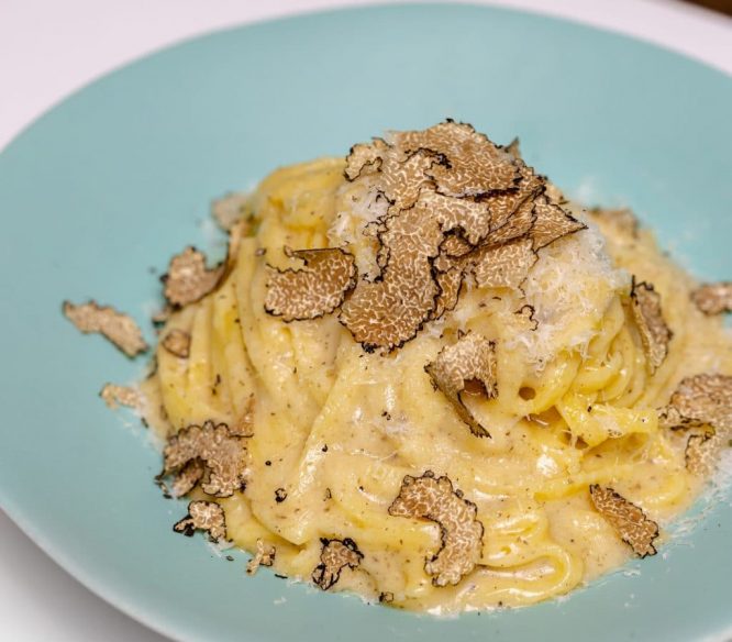 A delicious plate of creamy pasta served at Lina Stores in Soho
