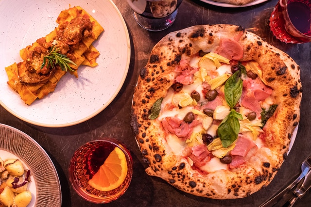 Pizza and Negronis served at the new Soho restaurant Negroni's