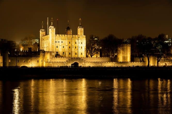 The Tower of London at nightfall lit up by lights