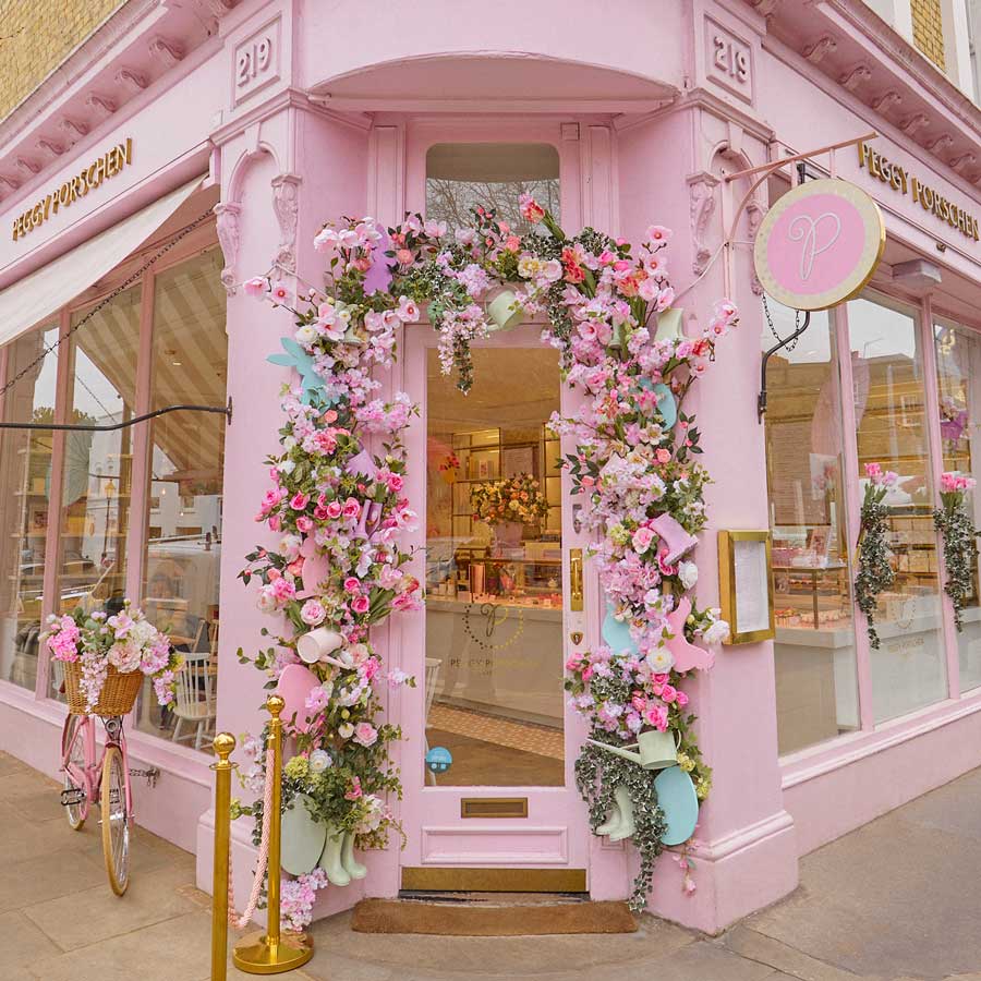 the pink, flower framed entrance to peggy porschen's Chelsea venue