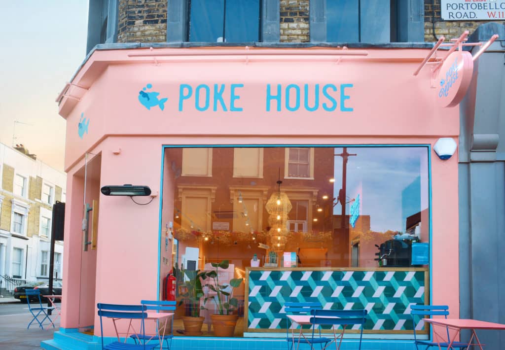 the pink walls that make up the exterior of poke house
