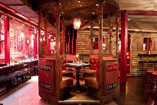 The bright red interior of Salvador and Amanda restaurant in Covent Garden, London