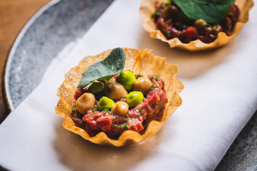a portion of Bistek Tartare Tartlet at Sarap, which features on one of the alternative Christmas menus in London