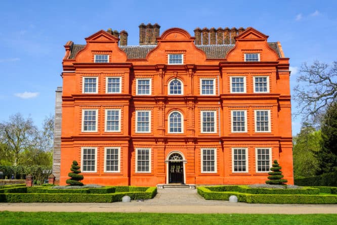 The orange exterior of Kew Palace – otherwise known as Dutch House – in Kew Gardens, London