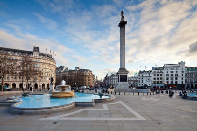 Bright sunlight and blue skies over Trafalgar Square, one of the best free things to do in London