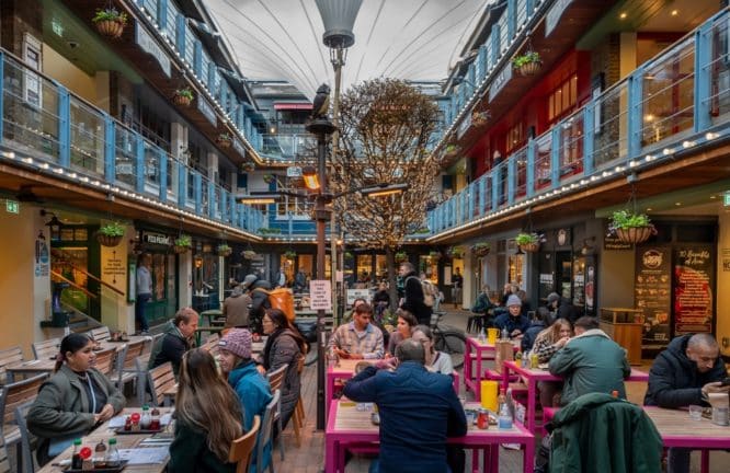 People enjoying themselves at the street food hall Kingly Court in Carnaby Street