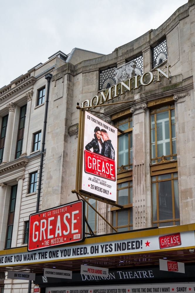 The sign for Grease The Musical at the Dominion Theatre in London, England