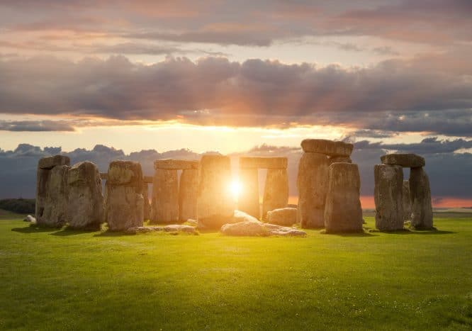 The iconic stones of Stonehenge in Wiltshire at sunset