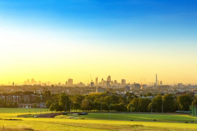 An incredible panoramic view of London bathed in the sunshine from atop Hampstead Heath