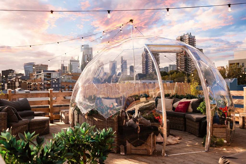 An igloo dining pod atop an east London rooftop.