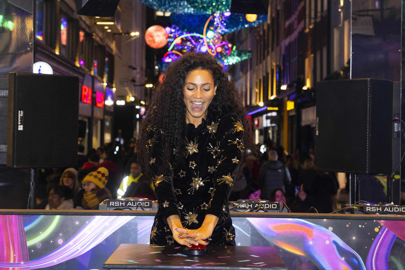 The presenter and Choose Love ambassador Vick Hope switching on the lights at Carnaby Street
